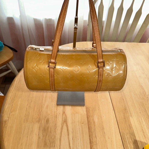 Louis Vuitton Handbags - Louis Vuitton Gold Barrel Shoulder Bag 
One Shot Look at Photos Please
